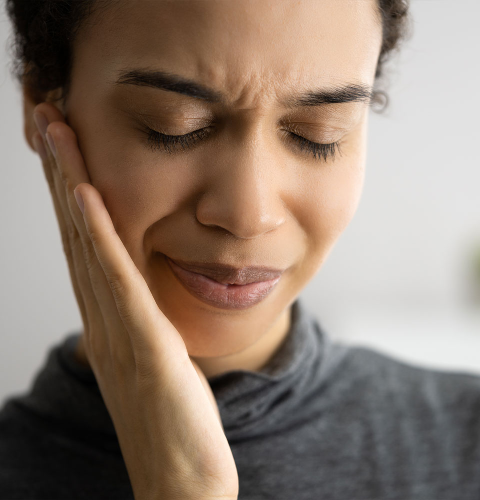 close up of female with mouth pain